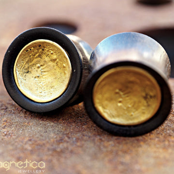 gold wooden ear plugs