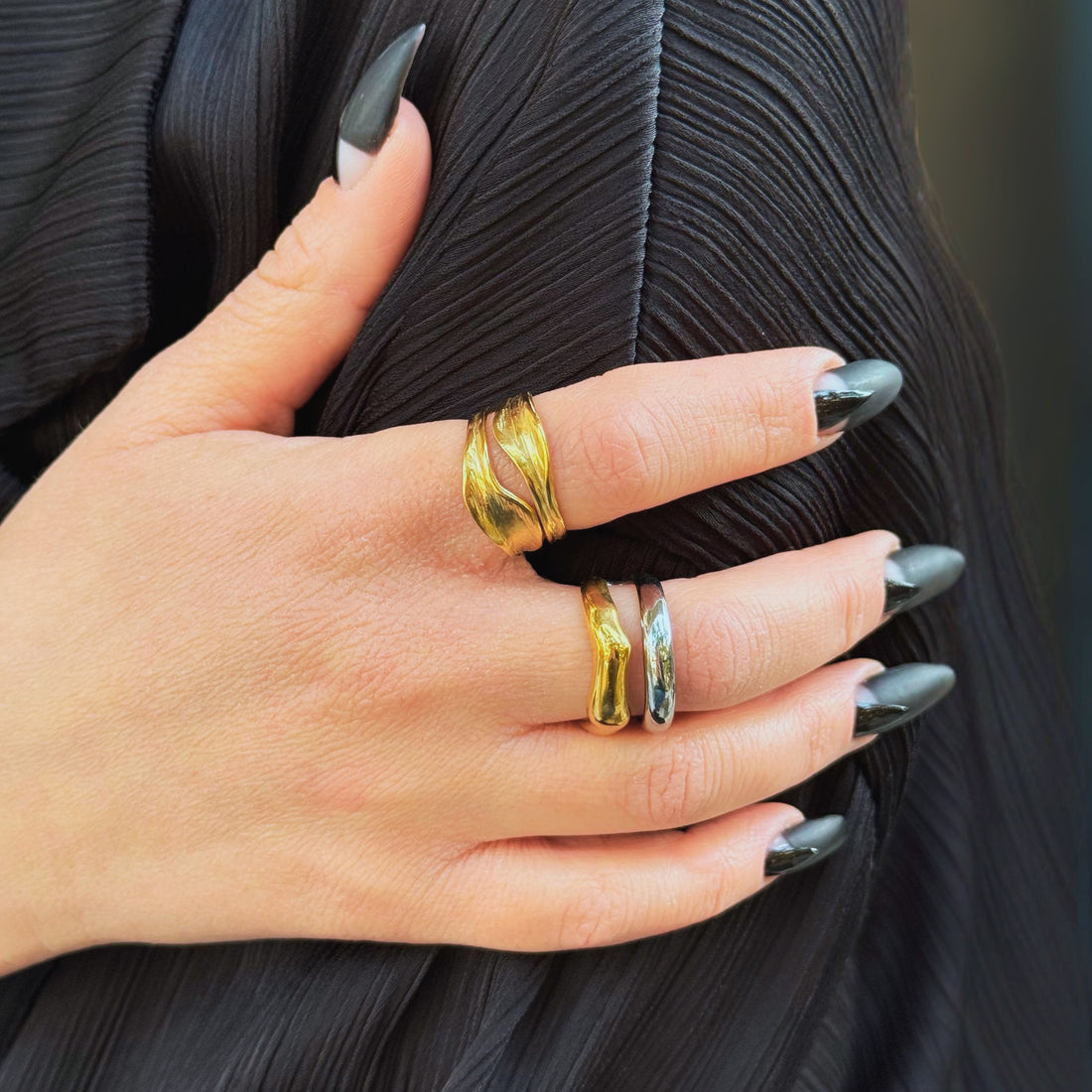 curve gold and silver ring