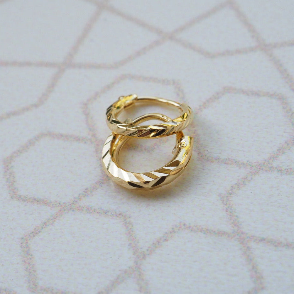 Twist gold plated piercing ring