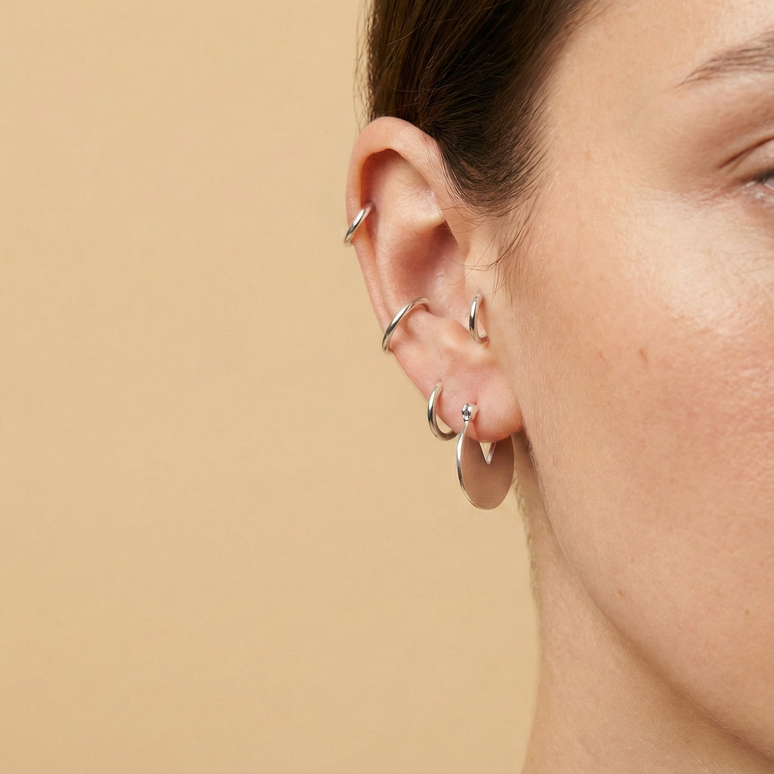 packman silver hoop earrings