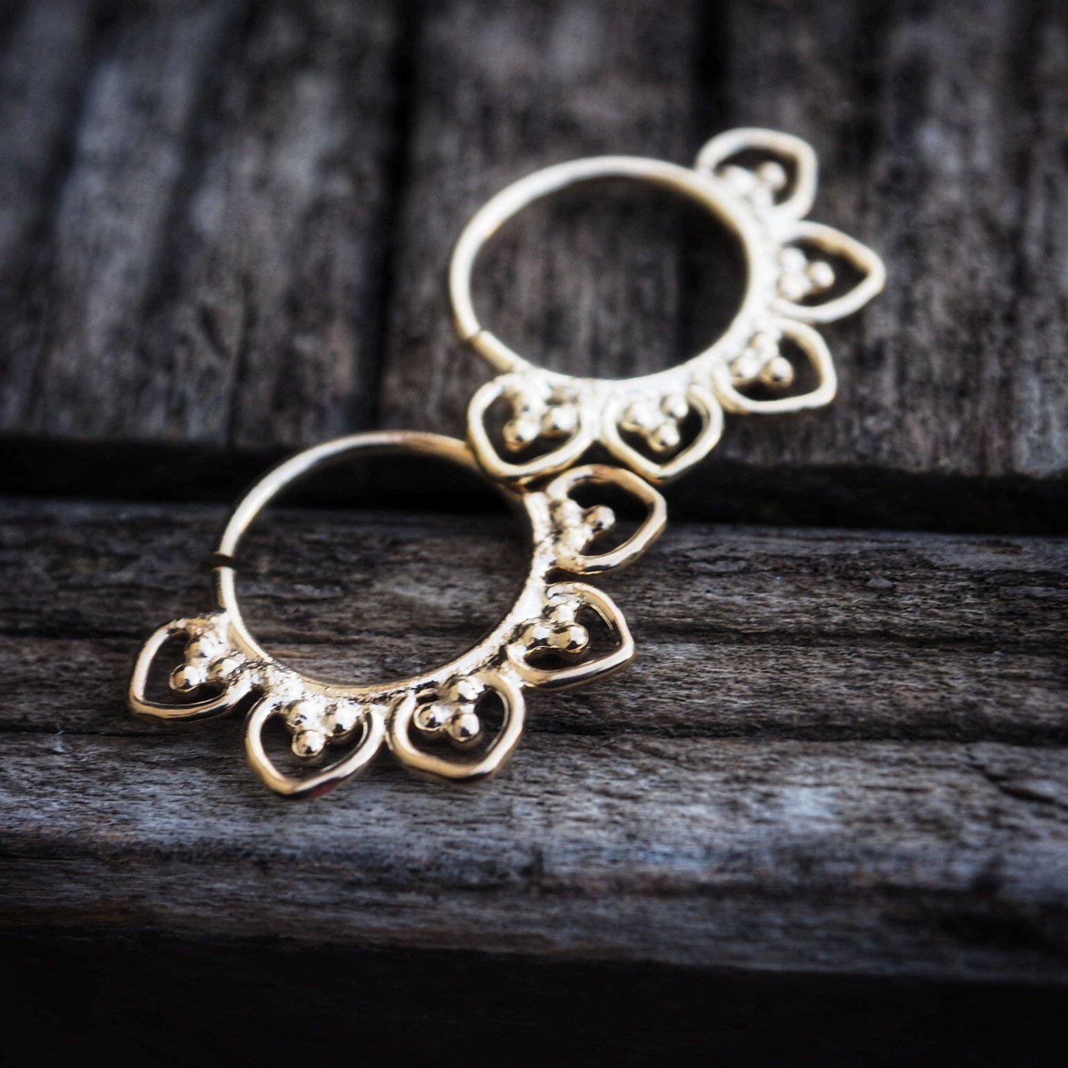 three 18.K gold hoop earrings-earrings-Magnetica