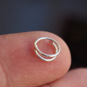 double silver piercing ring