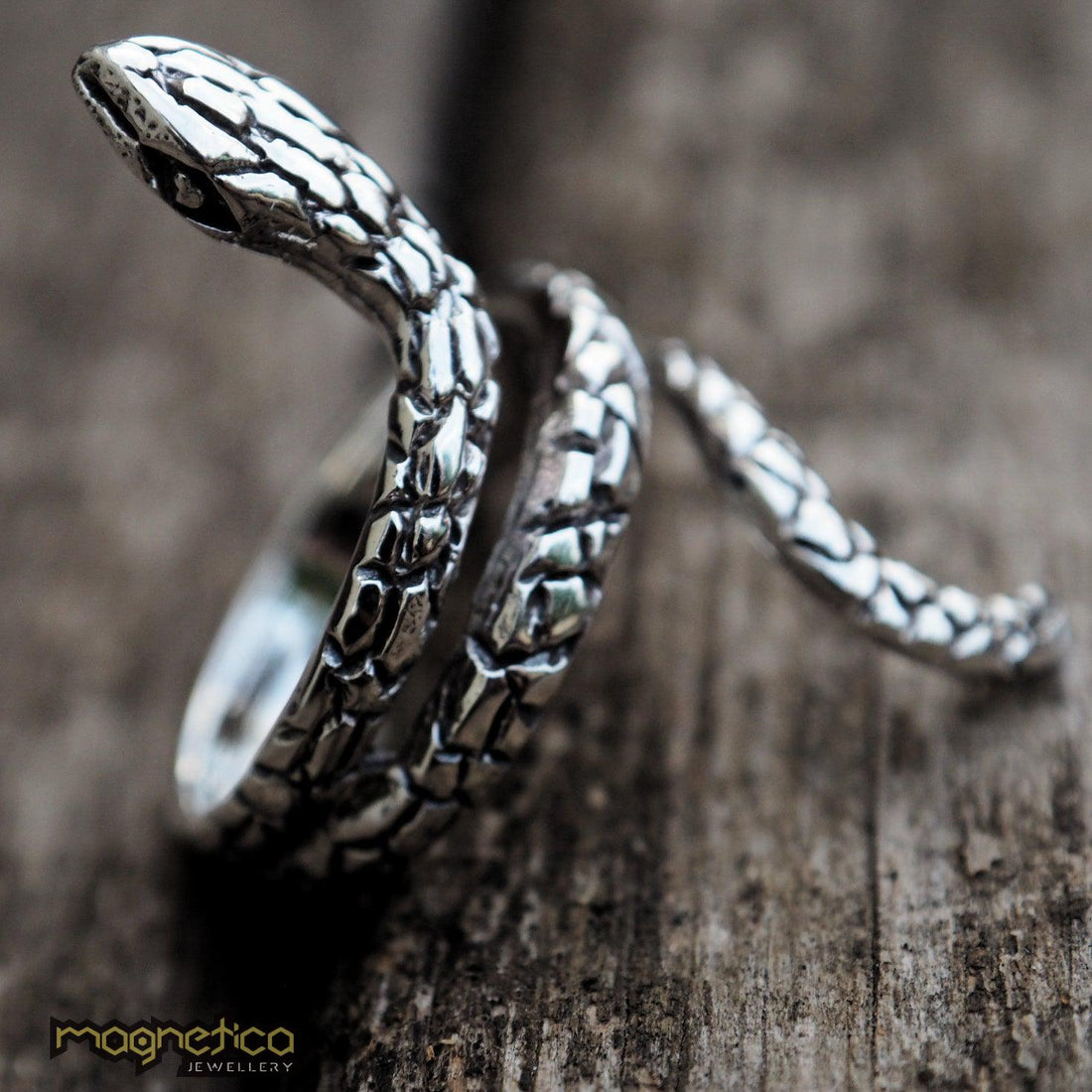 Serpent carved sterling silver ring