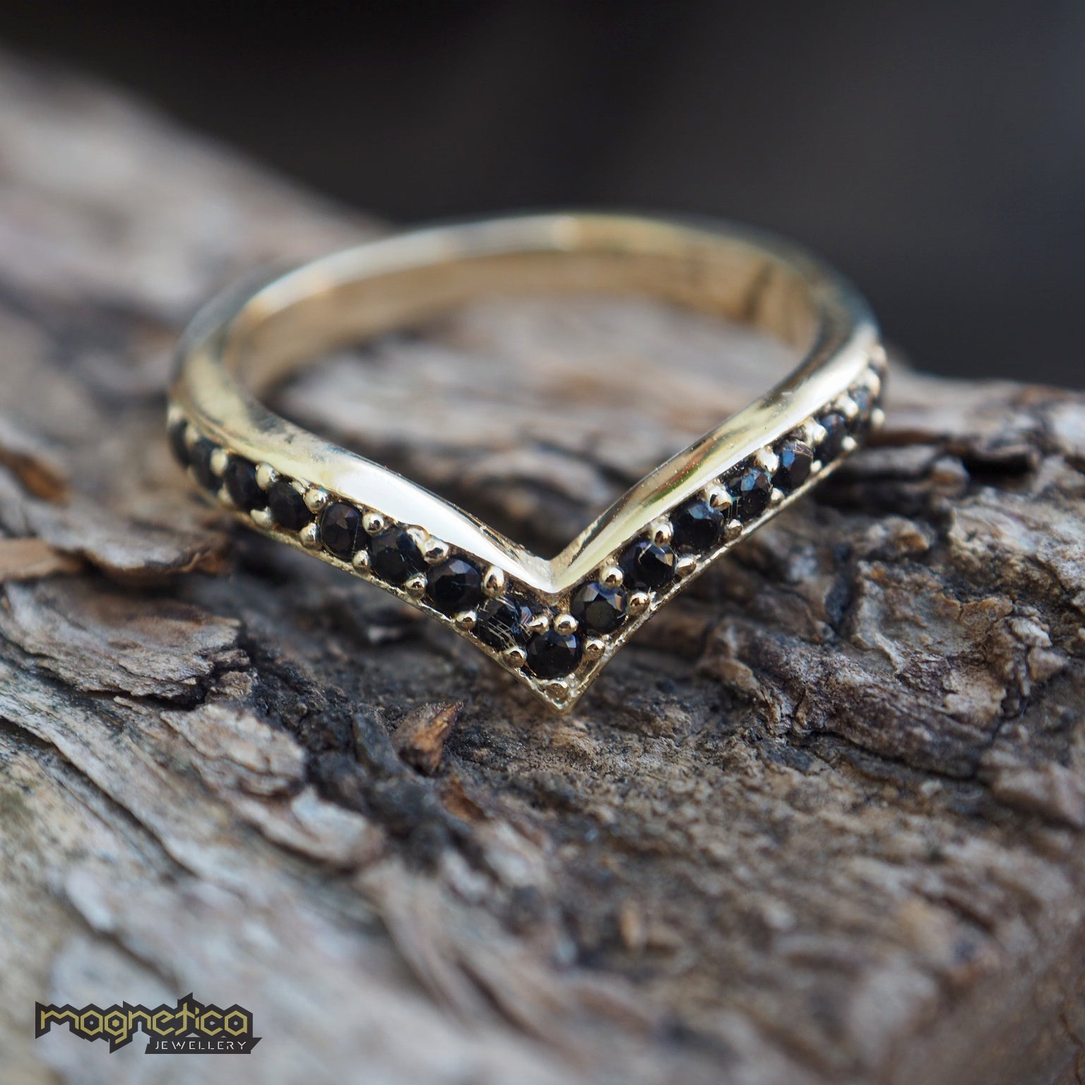 Gold black stones crown ring