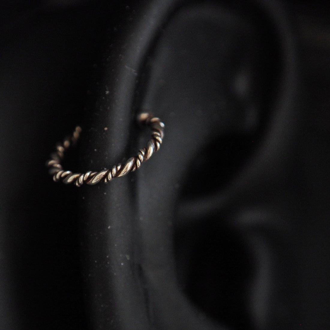 Gold twisted wire fake piercing