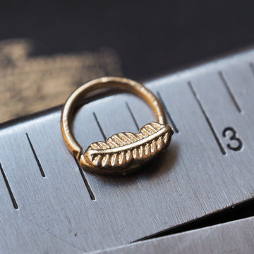 Gold feather piercing ring