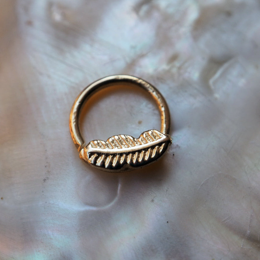 Gold feather piercing ring